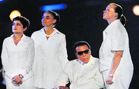 boxing legend Muhammad Ali looks on