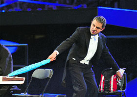 British actor Rowan Atkinson performs during the opening ceremony.