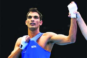 India�s Jai Bhagwan is declared the winner after his bout with Gani Zhailauov of Kazakhstan