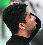 Abhinav Bindra reacts after failing to qualify for 10m air rifle event.