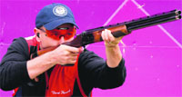 USA�s Vincent Hancock competes in the Shooting Skeet men qualification at the Royal Artillery Barracks in London on Tuesday. � AFP