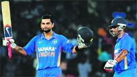 Virat Kohli celebrates after scoring a century during the fourth ODI between Sri Lanka and India in Colombo on Tuesday. India won by 6 wickets, clinching the five-match series 3-1. � AFP