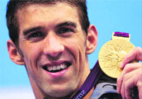Phelps with his 19th Olympic medal on Wednesday.
