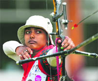 Deepika Kumari of India shoots during the women's individual round of 32 on Wednesday. 