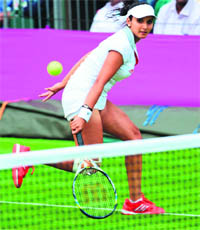 Sania Mirza in action at Wimbledon on Thursday. 