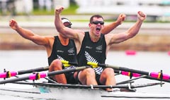 New Zealand's Joseph Sullivan (front) and Nathan Cohen celebrate winning the men's double sculls finals. � Reuters