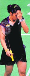 Saina Nehwal reacts after losing her semifinal match against China�s Wang Yihan in London on Friday. � PTI