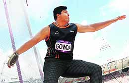 Vikas Gowda competes in the men's discus throw on Monday.