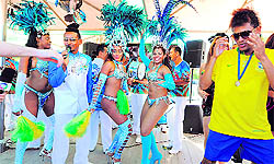 A Brazil fan breaks into a samba dance at Beija Flor samba school while watching the Brazil vs Mexico Olympic football final on Saturday