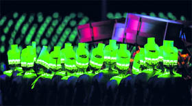 Perfomers parade with fancy costumes during the closing ceremony on Sunday night.