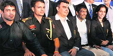 London Olympics medal winners attend a felicitation ceremony by the Indian Olympic Association in New Delhi on Friday 