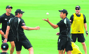 New Zealand captain Ross Taylor (2R) with team members during a training session at the Rajiv Gandhi International cricket stadium in Hyderabad on Sunday. New Zealand play two Test matches and two T20 matches against India
