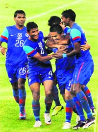 Indian players celebrate a goal against Syria in New Delhi on Wednesday. India won 2-1