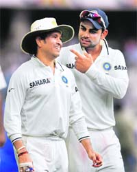 Virat Kohli with the man he worships, Sachin Tendulkar, during the recent Hyderabad Test against New Zealand