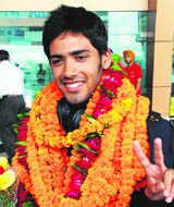 India Under-19 team member Prashant Chopra gets a hero�s welcome in Chandigarh on Wednesday. 