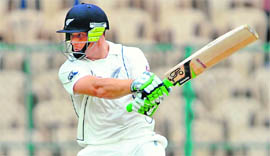 Martin Guptill hits a four in Bangalore on Friday. 