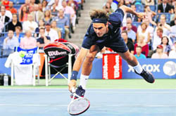 Roger Federer reaches out for a return to Bjorn Phau during the second round at the US Open in New York on Thursday. 