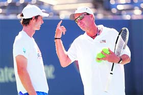 GETTING TIPS: Andy Murray of Great Britain seems to be getting some key instructions from his coach Ivan Lendl a day before the US Open final