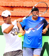 Yuki Bhambri watched by coach Nandan Bal at practice in Chandigarh on Friday.
