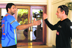 Yuvraj Singh is greeted by New Zealand's Brendon McCullum in Colombo on Friday. 