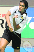 India�s PV Sindhu returns to Kaori Imabeppu of Japan during their first round match at the Japan Open in Tokyo. Sindhu won 21-18, 17-21, 21-13. � AFP