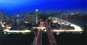 An aerial view of the illuminated F1 Marina Bay Street Circuit at dusk in Singapore on Friday.