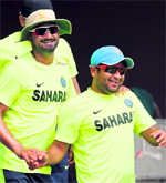 Harbhajan Singh and Piyush Chawla banter during practice on Saturday.