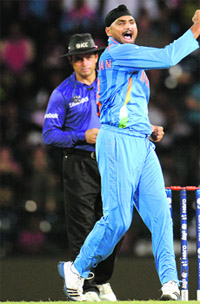 Harbhajan Singh exults after taking Eoin Morgan�s wicket in Colombo on Sunday. 