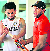 Virat Kohli and Yuvraj Singh during a practice session at Colombo on Tuesday