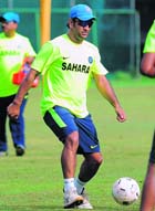 MS Dhoni during a training session on Saturday. 