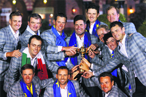 Team Europe after retaining the Ryder Cup in Medinah, Illinois, on Sunday. 