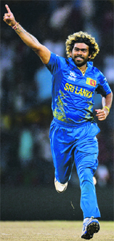 Lasith Malinga celebrates after dismissing Jos Buttler on Monday. 