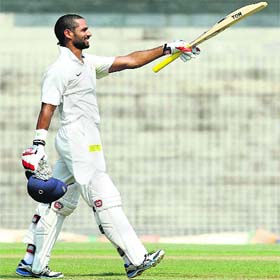 Shikhar Dhawan celebrates his century in Chennai on Saturday