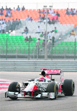 Narain Karthikeyan drives during the inaugural Indian F1 Grand Prix at the Buddh Circuit last year