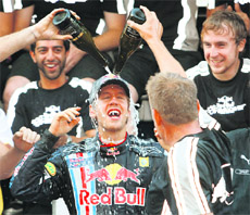 Sebastian Vettel celebrates. 
