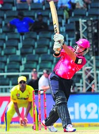 Michael Lumb of Sydney Sixers goes for a big one