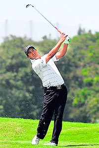 Shiv Kapur hits an iron during his round of 67 in the first round of the Indian Open in Bangalore on Thursday