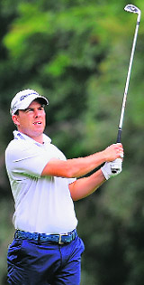 Richie Ramsay hits an iron shot during his round of 66 on the second day of the Indian Open in Bangalore on Friday. 