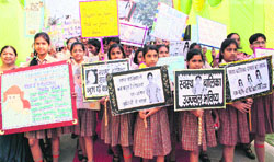 Schoolchildren carry placards with the message to celebrate a cracker-free Diwali in Rohtak. Photo: Manoj Dhaka