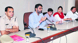 Deputy Commissioner Mandeep Singh Brar (second from left) along with Police Superintendent Rakesh Arya (extreme left) addresses a high-level action committee meeting held in the conference hall of the mini-secretariat. Photo: DR Vij