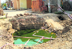 The road leading to a colony remains cut off from the main road. Photo by writer