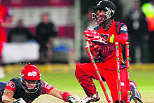 Lions� Thami Tsolekile tries to run out Kevin Pietersen during the first semifinal on Thursday. 