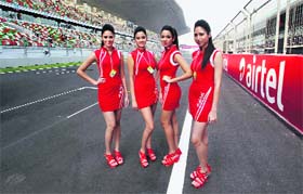 Grid girls strike a pose at BIC on Friday.