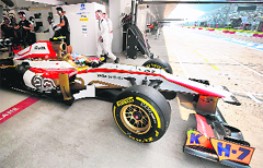 HRT�s Narain Karthikeyan comes out of the paddock. � AFP