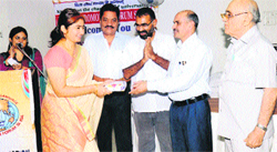 JS Jakhar (second from right) honours Kumud Singh while RS Sangwan (extreme right), Umed Singh and Amir Chawla look on in the annual function of English Promotion Forum at Sirsa. A Tribune photograph