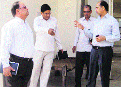 HUDA administrator Chander Prakash inspects construction work of a community centre in Jhajjar. Photo by writer