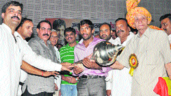 People of Brahman community felicitate Yogeshwar Dutt by presenting a Hanuman Gada at a function in Jhajjar. Photo: Ravinder Saini