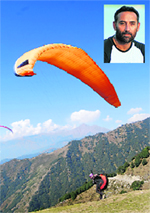 A participant (inset) takes off from Billing on Day Four of the International Paragliding Competition that concluded on Monday. � Tribune photo