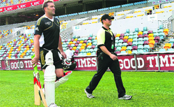 South Africa�s Jacques Kallis is escorted by a security guard after nets in Brisbane on Wednesday. � AP/PTI
