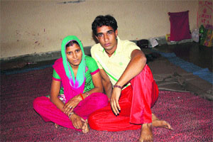 A runaway couple at a makeshift shelter home at Bal Bhawan, Rohtak.